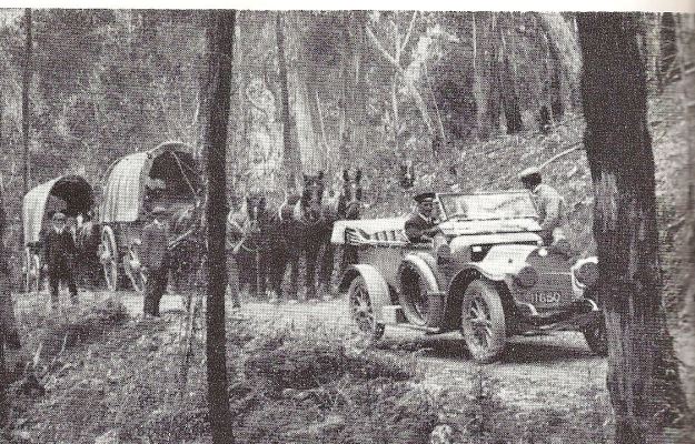Inspecting the remote Dargo Road in a chauffeur driven car, also in 1913.